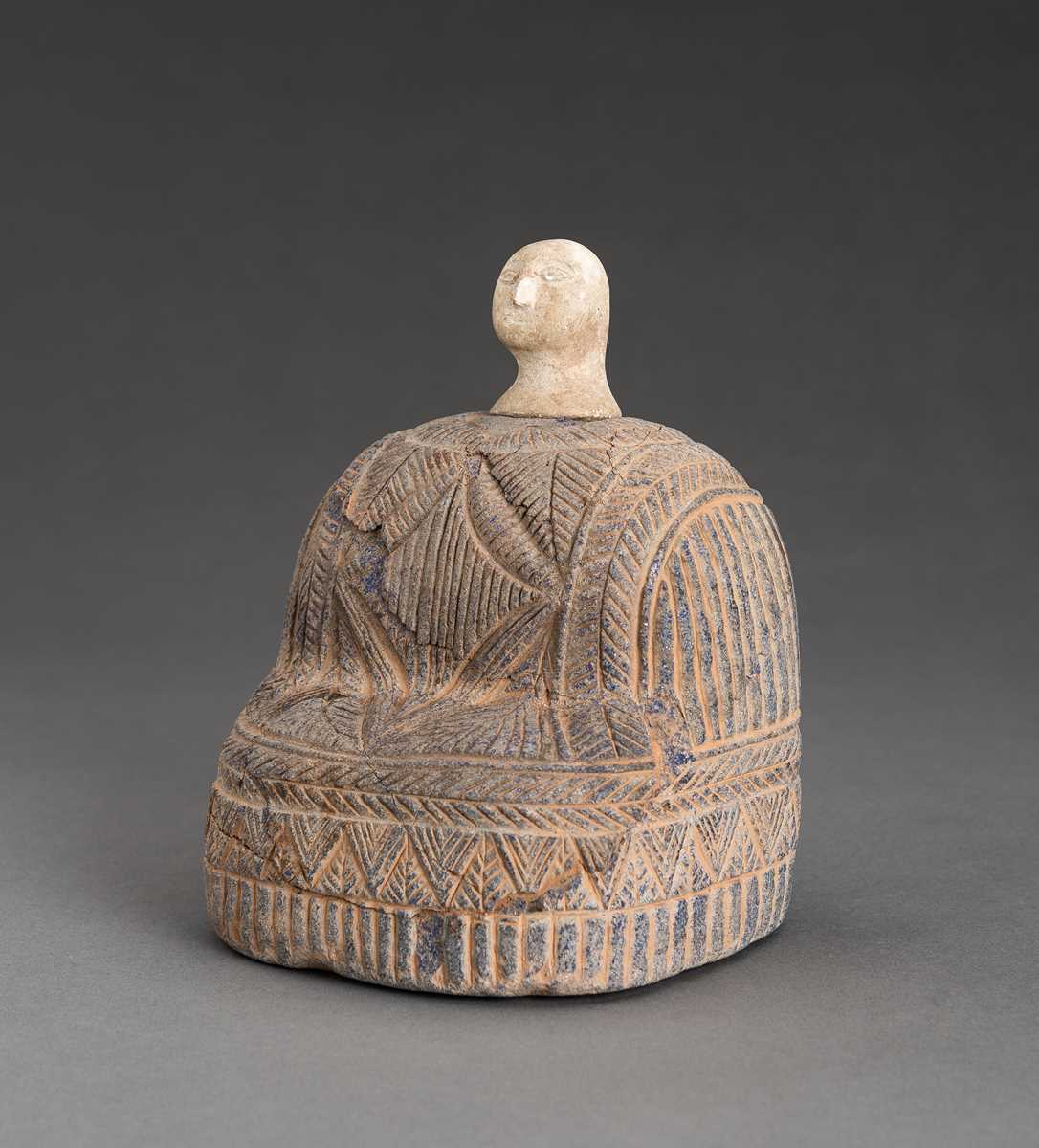 Lot 1604 - A BACTRIAN LAPIS LAZULI SEATED FEMALE FIGURE