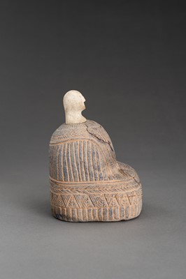 Lot 1604 - A BACTRIAN LAPIS LAZULI SEATED FEMALE FIGURE