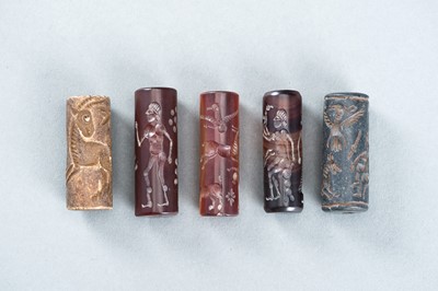 Lot 975 - FIVE BACTRIAN STONE AND AGATE CYLINDER SEALS