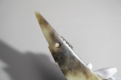 Lot 793 - A CELADON AND RUSSET QI JADE BLADE, QIJIA CULTURE