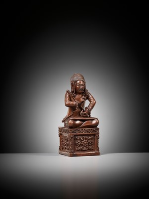Lot 10 - A MASTERFULLY CARVED HARDWOOD FIGURE OF A BUDDHIST PRIEST, SCHOOL OF CHOYING DORJE