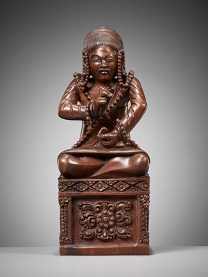 Lot 175 - A MASTERFULLY CARVED HARDWOOD FIGURE OF A BUDDHIST PRIEST, SCHOOL OF CHOYING DORJE