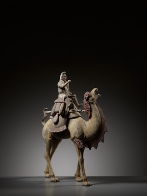 Lot 69 - A MASSIVE PAINTED POTTERY FIGURE OF A BACTRIAN CAMEL AND SOGDIAN RIDER, TANG DYNASTY