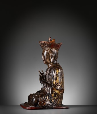 Lot 663 - A GILT AND LACQUERED WOOD FIGURE OF BUDDHA, VIETNAM, 17TH-18TH CENTURY