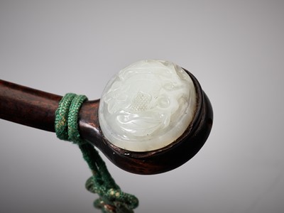 Lot 357 - A PALE CELADON JADE-MOUNTED WOOD RUYI SCEPTER, QING DYNASTY