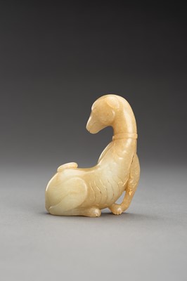 Lot 141 - A PALE YELLOW JADE FIGURE OF A DOG, QING