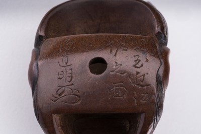 Lot 1510 - NAOAKI: A BOXWOOD MASK NETSUKE OF HANNYA