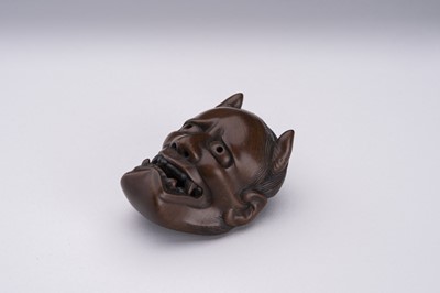 Lot 1510 - NAOAKI: A BOXWOOD MASK NETSUKE OF HANNYA