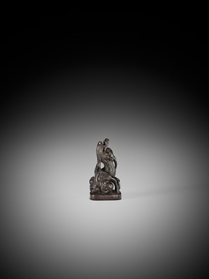 Lot 1416 - A FINE WOOD NETSUKE OF A BAYING KIRIN IN THE STYLE OF MITSUHARU