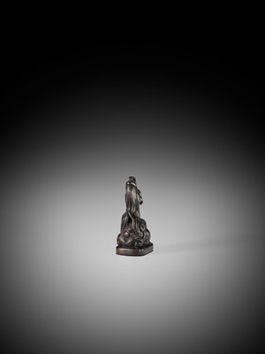 Lot 1416 - A FINE WOOD NETSUKE OF A BAYING KIRIN IN THE STYLE OF MITSUHARU