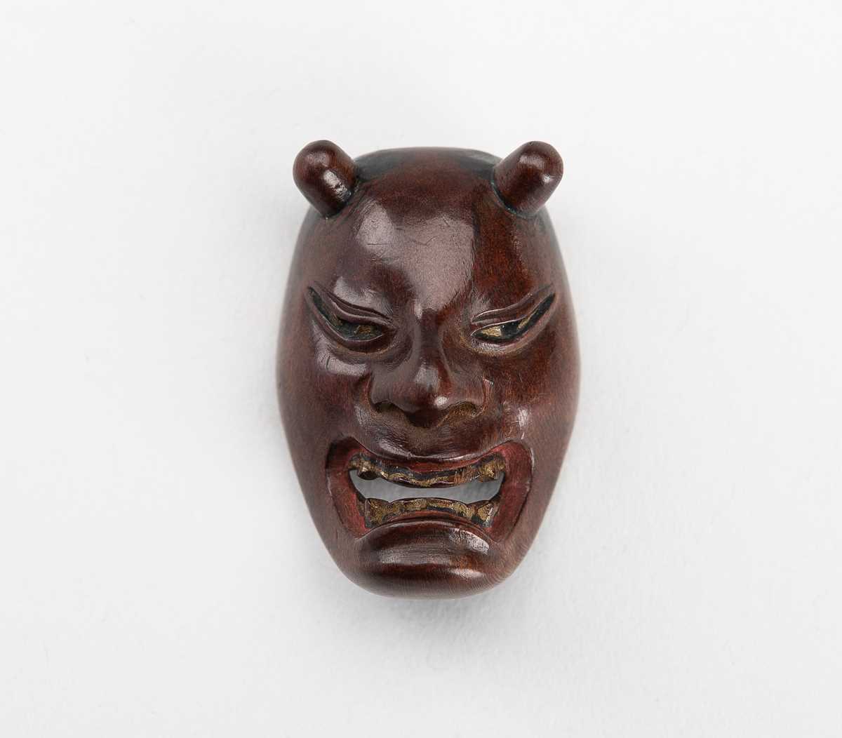 Lot 1504 - DEME UMAN: A WOOD MASK NETSUKE OF HANNYA NAMANARI