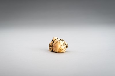 Lot 374 - AN IVORY NETSUKE OF HOTEI WITH HIS TREASURE BAG