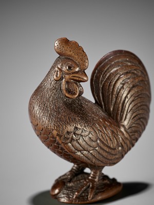 Lot 23 - A RARE WOOD NETSUKE OF A COCKEREL ON AWABI