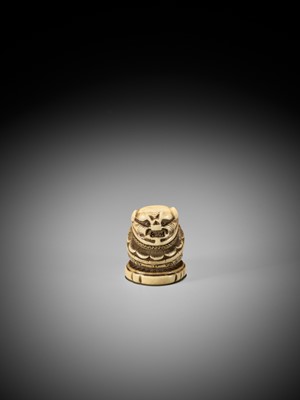 Lot 191 - A RARE IVORY ‘SILK SEAL’ TYPE NETSUKE OF A FOREIGNER