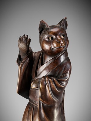 Lot 167 - SHOKO SUGONOYA: A RARE AND FINE WOOD OKIMONO OF A CAT GEISHA