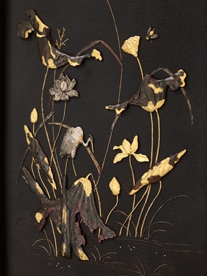 Lot 184 - A FINE INLAID IRON PANEL DEPICTING EGRETS AND LOTUS