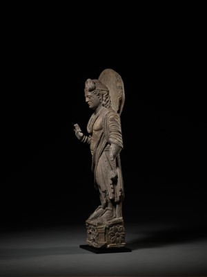 Lot 227 - A LARGE AND IMPORTANT GRAY SCHIST FIGURE OF MAITREYA, ANCIENT REGION OF GANDHARA