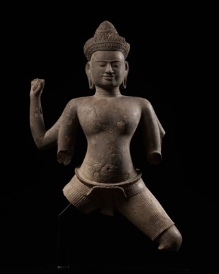 Lot 276 - A KHMER SANDSTONE FIGURE OF A MALE DEITY, ANGKOR PERIOD