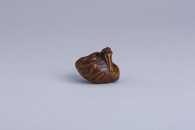 Lot 333 - MASANAO: A WOOD NETSUKE OF A SNARLING TIGER, EDO PERIOD