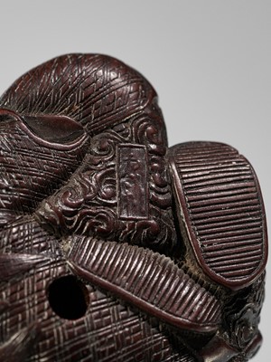Lot 1449 - TADATOSHI: A SUPERB NAGOYA SCHOOL WOOD NETSUKE OF A SEATED SLEEPING SHOJO