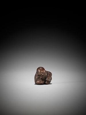 Lot 1449 - TADATOSHI: A SUPERB NAGOYA SCHOOL WOOD NETSUKE OF A SEATED SLEEPING SHOJO
