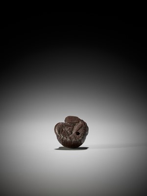 Lot 1449 - TADATOSHI: A SUPERB NAGOYA SCHOOL WOOD NETSUKE OF A SEATED SLEEPING SHOJO