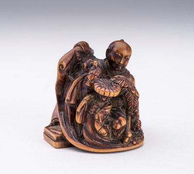 Lot 684 - SHOSAI: A WOOD NETSUKE WITH OTSU-E-FIGURES