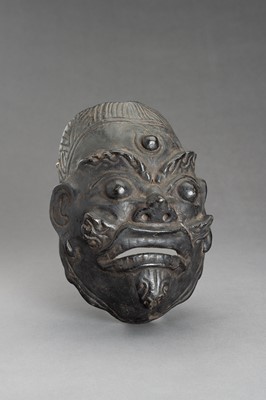 Lot 310 - A BLACK LACQUERED WOOD MASK OF WRATHFUL DEITY