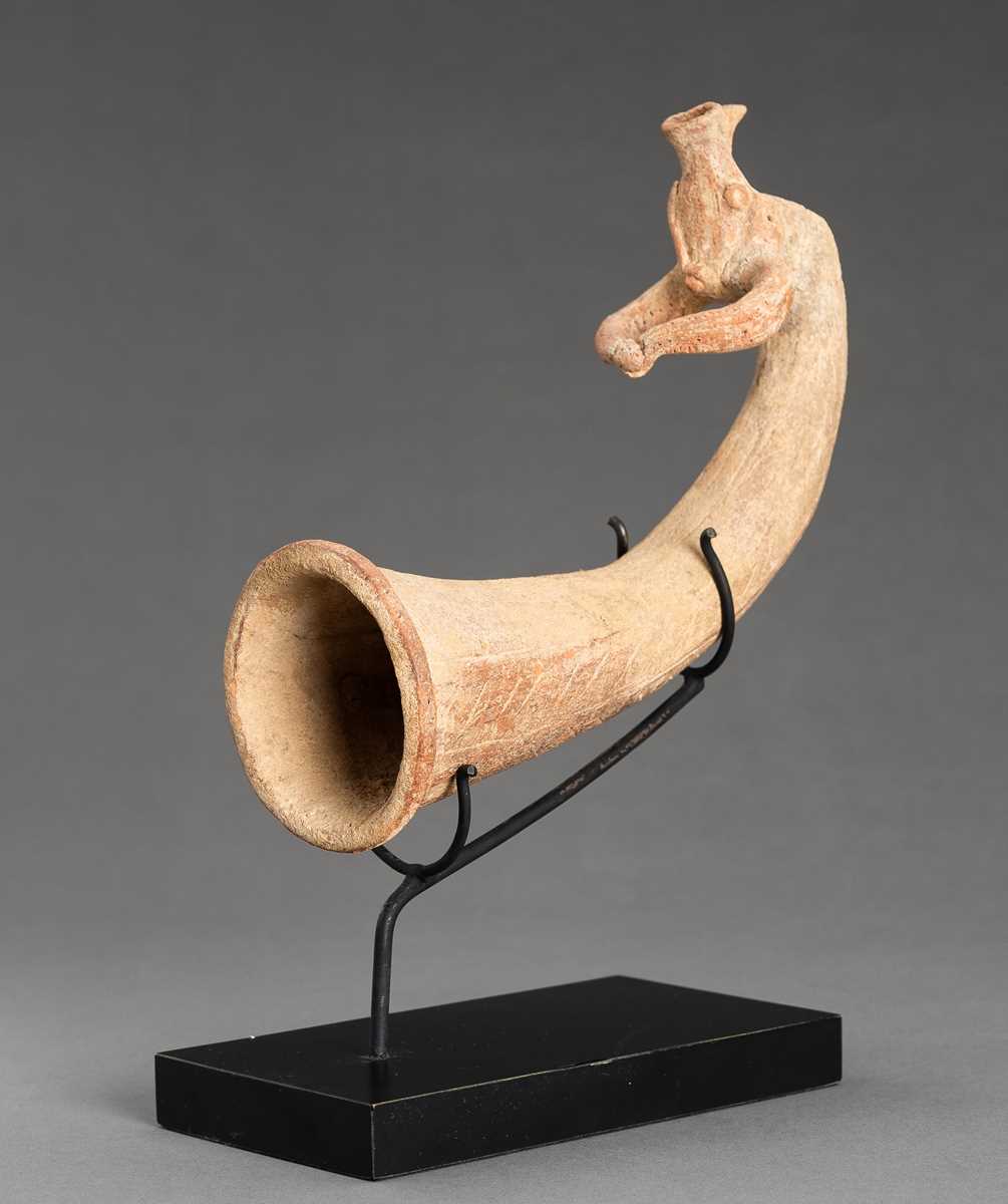 Lot 999 - AN ACHAEMENID TERRACOTTA RHYTON