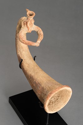 Lot 999 - AN ACHAEMENID TERRACOTTA RHYTON