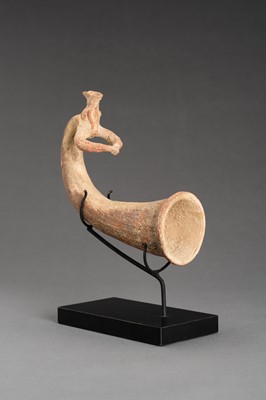 Lot 999 - AN ACHAEMENID TERRACOTTA RHYTON