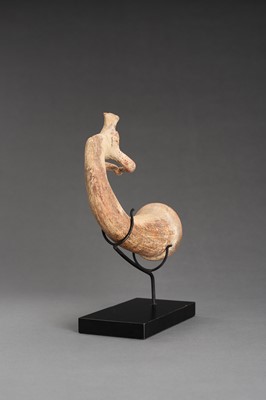 Lot 999 - AN ACHAEMENID TERRACOTTA RHYTON