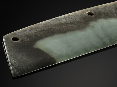 Lot 773 - A LARGE GREEN AND BROWN CEREMONIAL JADE BLADE, QIJIA CULTURE