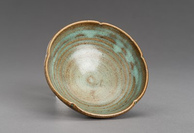 Lot 790 - A LOBED TURQUOISE AND BROWN GLAZED CERAMIC BOWL