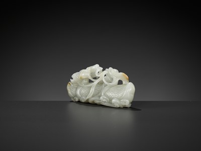 Lot 42 - A CELADON AND RUSSET JADE GROUP DEPICTING THREE GEESE WITH LOTUS, 18TH CENTURY