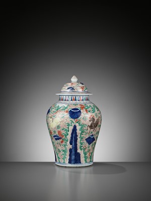 Lot 76 - A WUCAI GLAZED ‘HEAVENLY HORSES’ BALUSTER JAR AND COVER, TRANSITIONAL PERIOD