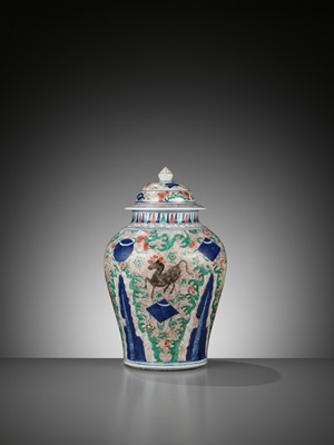 Lot 76 - A WUCAI GLAZED ‘HEAVENLY HORSES’ BALUSTER JAR AND COVER, TRANSITIONAL PERIOD