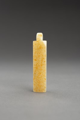 Lot 180 - A PALE CELADON AND RUSSET JADE PLUME HOLDER