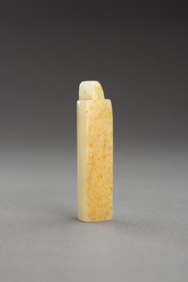 Lot 180 - A PALE CELADON AND RUSSET JADE PLUME HOLDER
