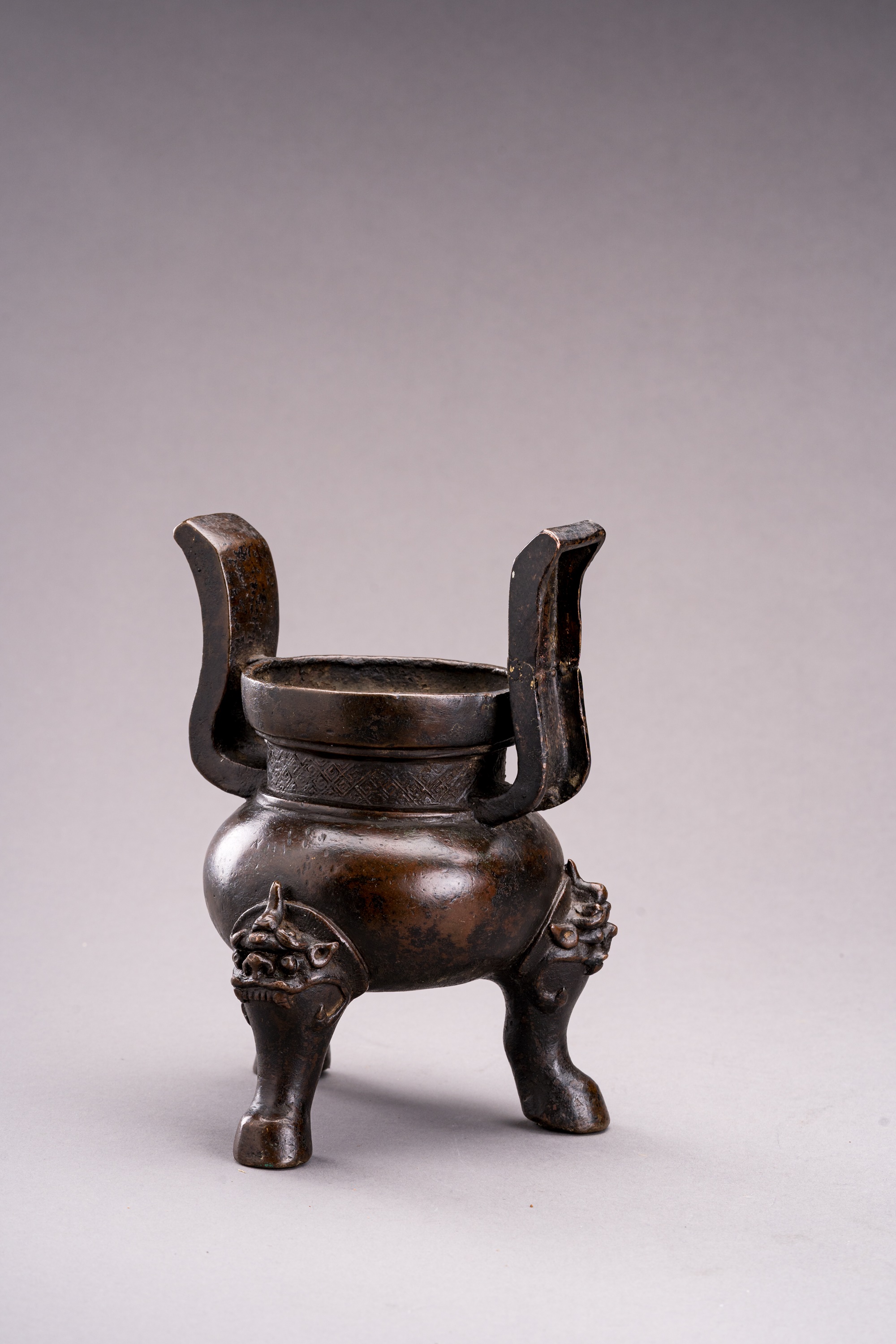 Lot 235 - A LUDUAN TRIPOD BRONZE CENSER, MING