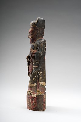 Lot 45 - A LACQUERED WOOD FIGURE OF A DIGNITARY, EARLY QING