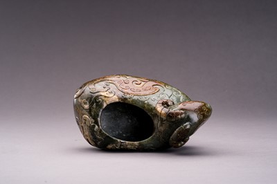AN ARCHAISTIC SPINACH GREEN AND RUSSET JADE ‘RAM’ VESSEL