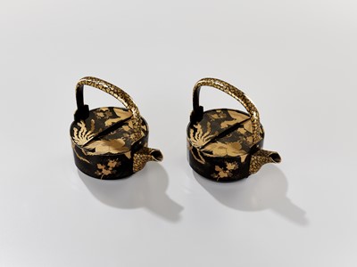 Lot 29 - A PAIR OF BLACK AND GOLD LACQUER CHOSHI (SAKE EWERS) AND COVERS