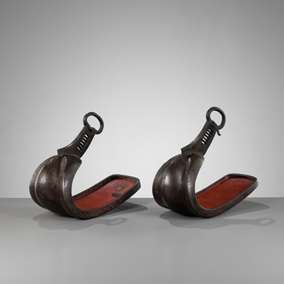 Lot 399 - YOSHITSUGU: A PAIR OF GILT AND SILVER-INLAID LACQUERED IRON STIRRUPS (ABUMI)