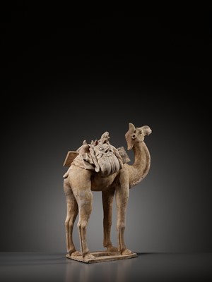 Lot 70 - A RARE AND LARGE POTTERY GROUP OF A MONKEY RIDING A CAMEL, TANG DYNASTY