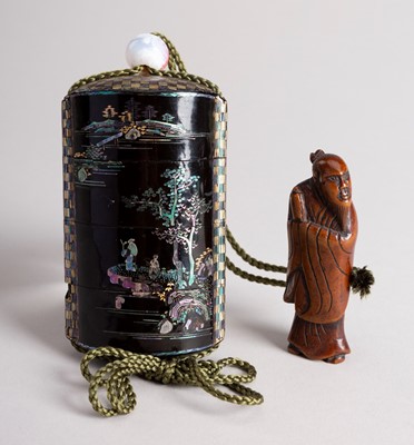 Lot 490 - A THREE-CASE MOTHER-OF-PEARL SOMADA STYLE INRO WITH BOXWOOD NETSUKE