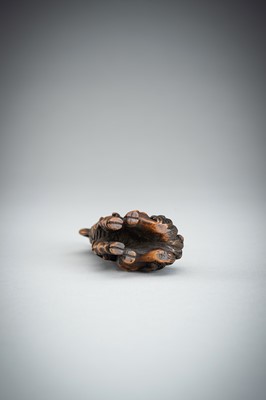 Lot 886 - KOMEI: A WOOD NETSUKE OF A KIRIN