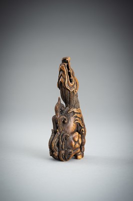 Lot 886 - KOMEI: A WOOD NETSUKE OF A KIRIN