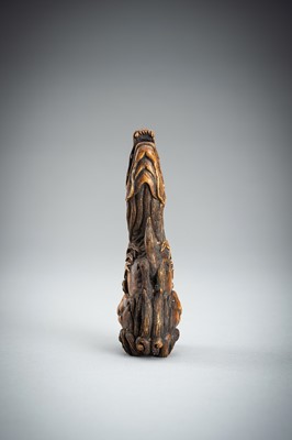 Lot 886 - KOMEI: A WOOD NETSUKE OF A KIRIN