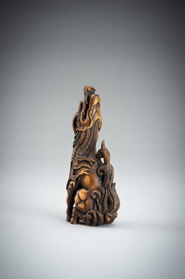 Lot 886 - KOMEI: A WOOD NETSUKE OF A KIRIN